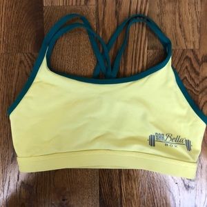 Born Primitive neon yellow and teal sports bra